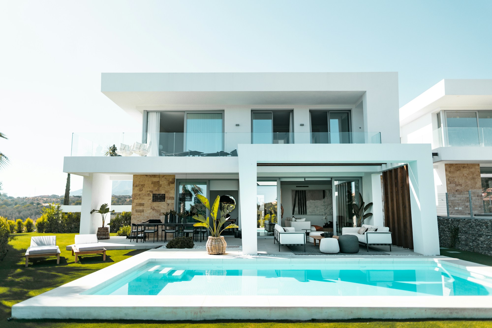 Illustrative contemporary villa with open terraces and a private pool